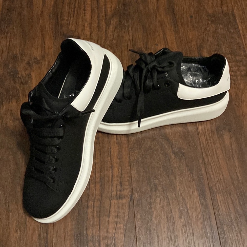 Alexander McQueen shoes. Black with white bottoms.